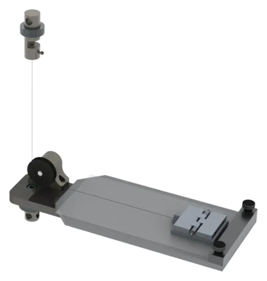 Dispositivo Biopdi para la determinación del coeficiente de fricción según ASTM D1894, con la mesa horizontal, el trineo y la polea que lo une a la máquina universal de ensayos