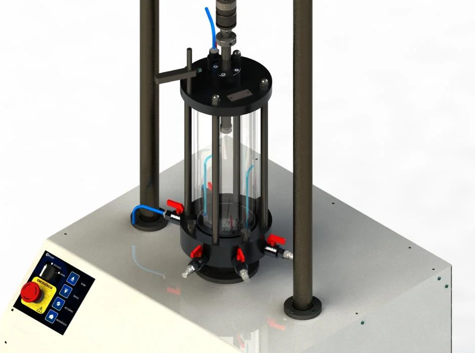 Biopdi 3-inch static triaxial cell mounted in the load frame, with the load cell coupling on the shaft
